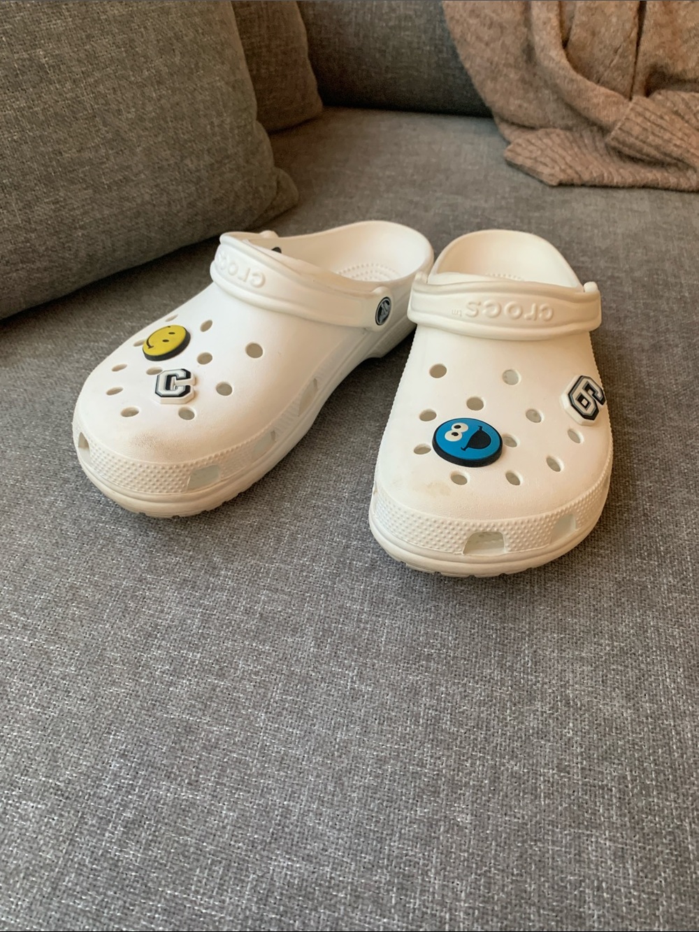 CROCS Classic Clog in White with Charms. Size women’s 9